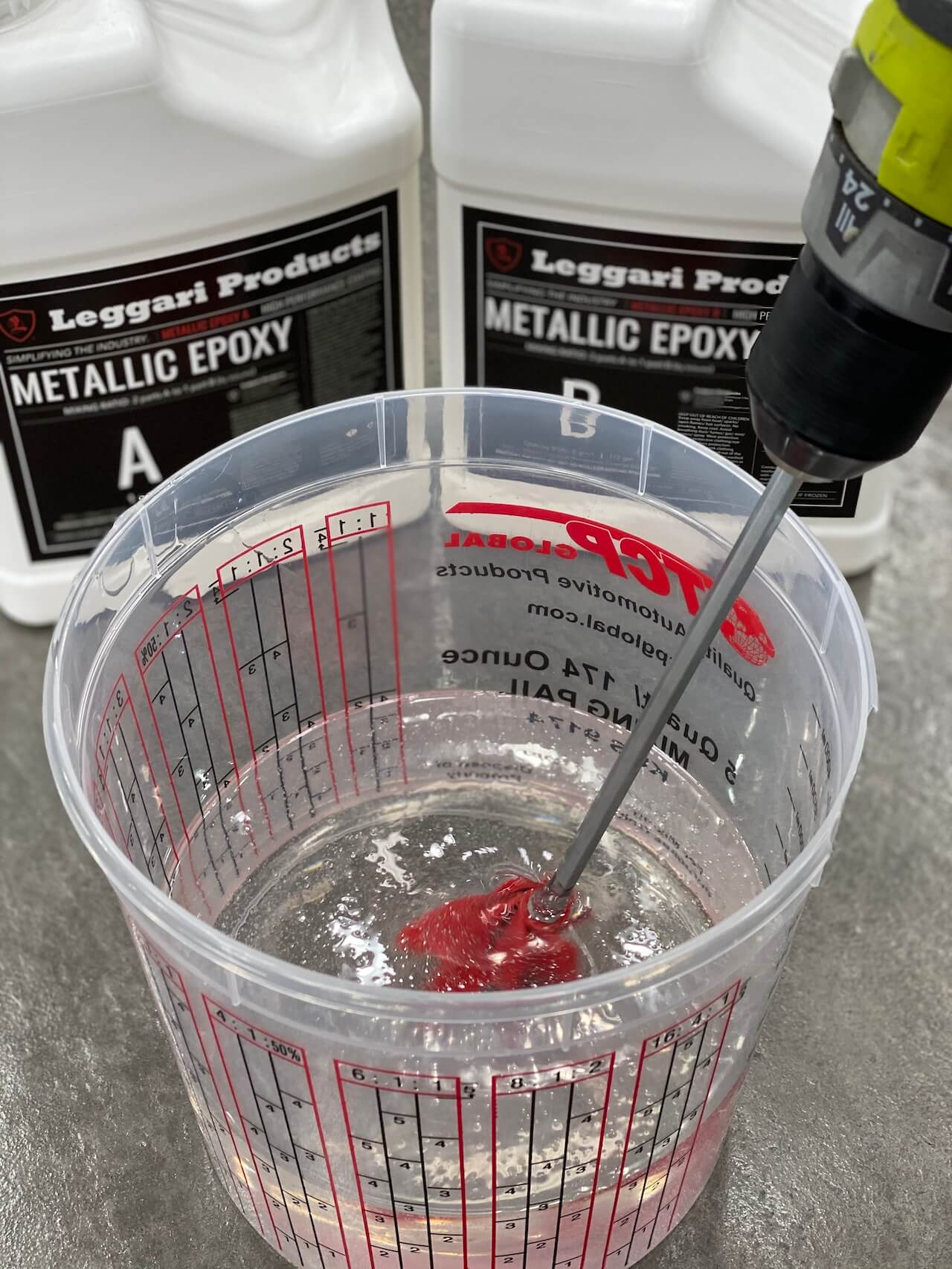 Mixing Leggari Products' Part A and Part B metallic epoxy.