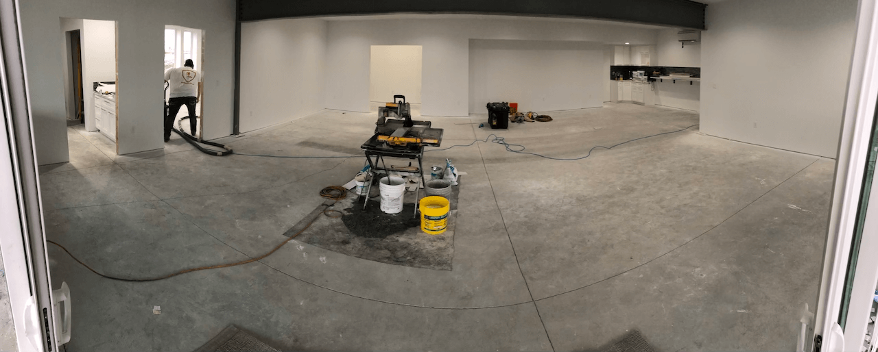 Preparing a concrete floor prior to the installation of epoxy.