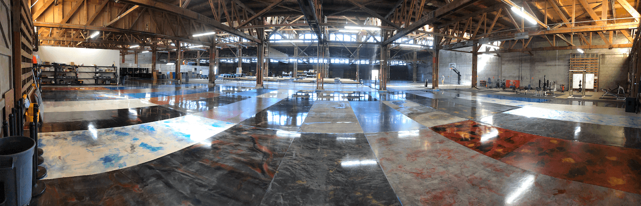 Dozens of metallic epoxy floors shown in the Leggari warehouse.